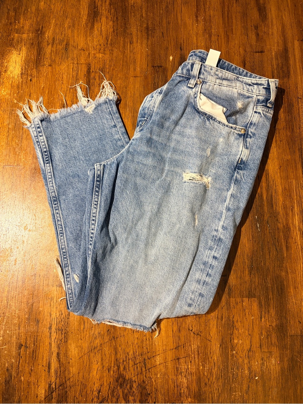 Boyfriend Jeans with Distressed Hem in Light Blue